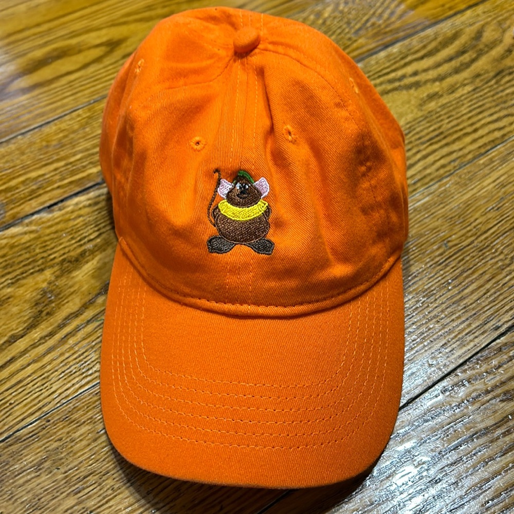 Orange Velcro back cap.  One size.  Embroidery on front. Small stain.